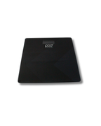 A sleek, black rectangular digital body scale with a glossy finish and a small white 'pod' logo in the center, shown on a plain white background.