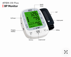 A digital wrist blood pressure monitor labeled PBM-09 Plus, shown on a white background with callout labels pointing to parts such as the cuff, arm sensor, charging connector, and settings. The monitor has a white body, a black cuff, and a green display screen.